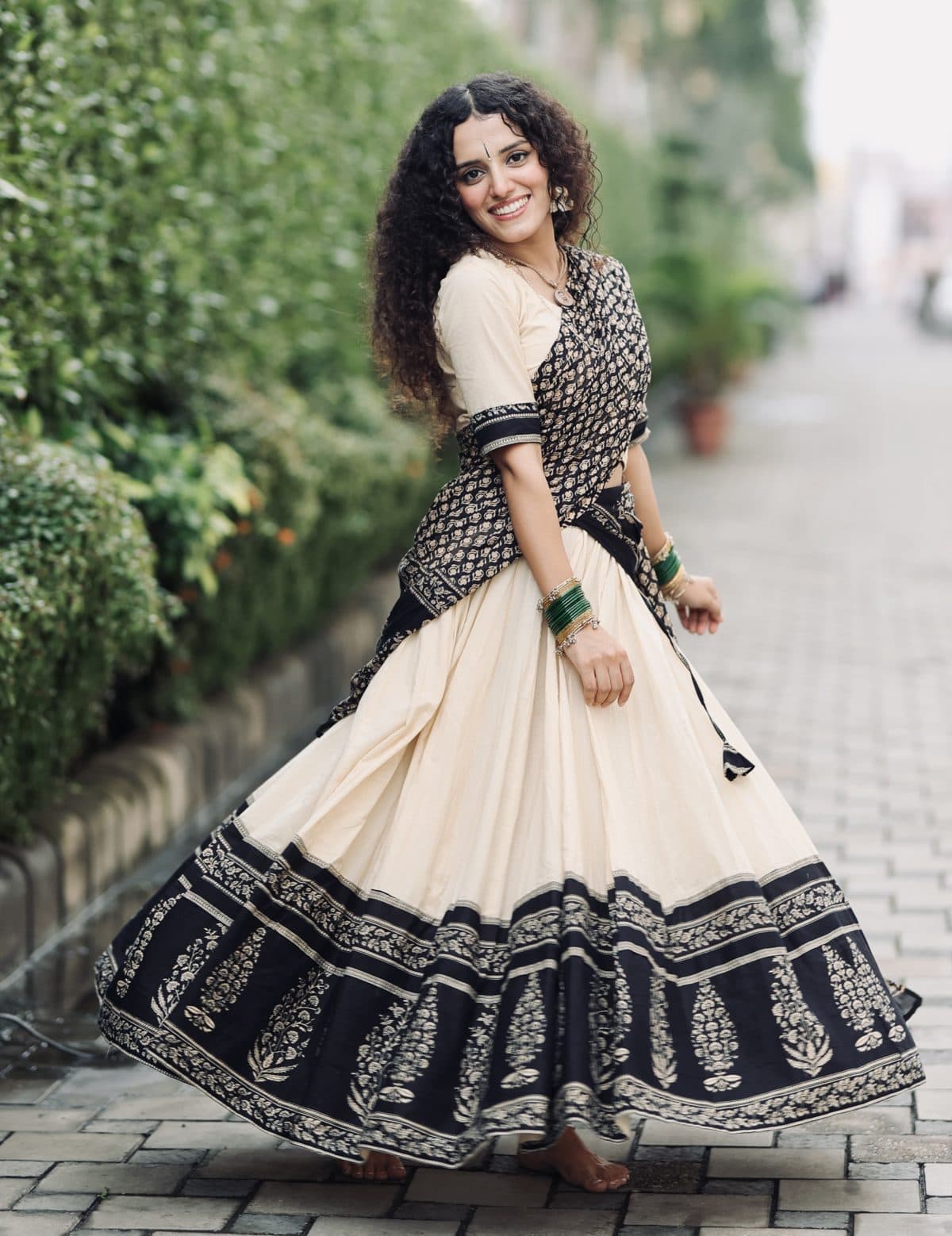 Kantika – Cream skirt with black buti border and a black dupatta Gopi Dress